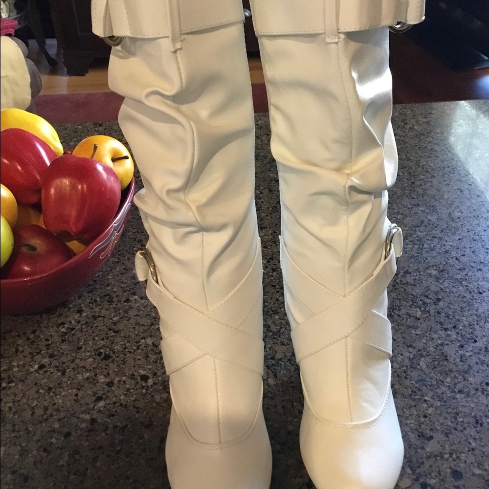 Forever white calf length boots w/ buckle accents.